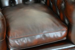 gebruikte chesterfield lowback chair